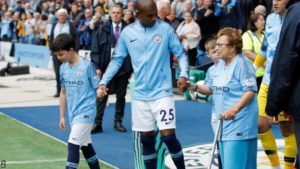 Olga Halon, 97, accompanied Manchester City midfielder Fernandinho on to the pitch